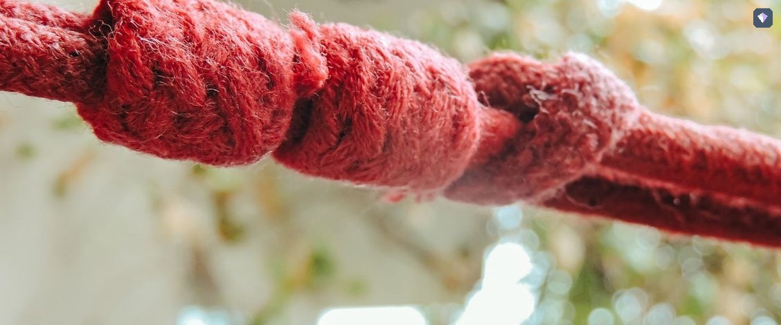 A red rope tied in a knot