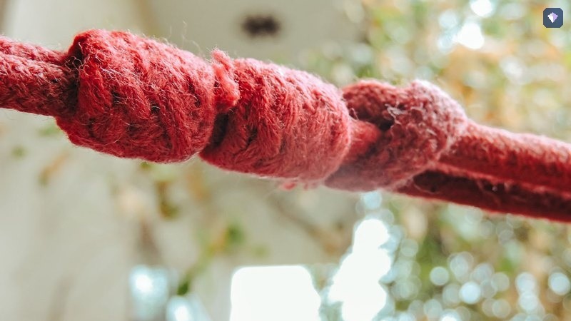 A red rope tied in a knot